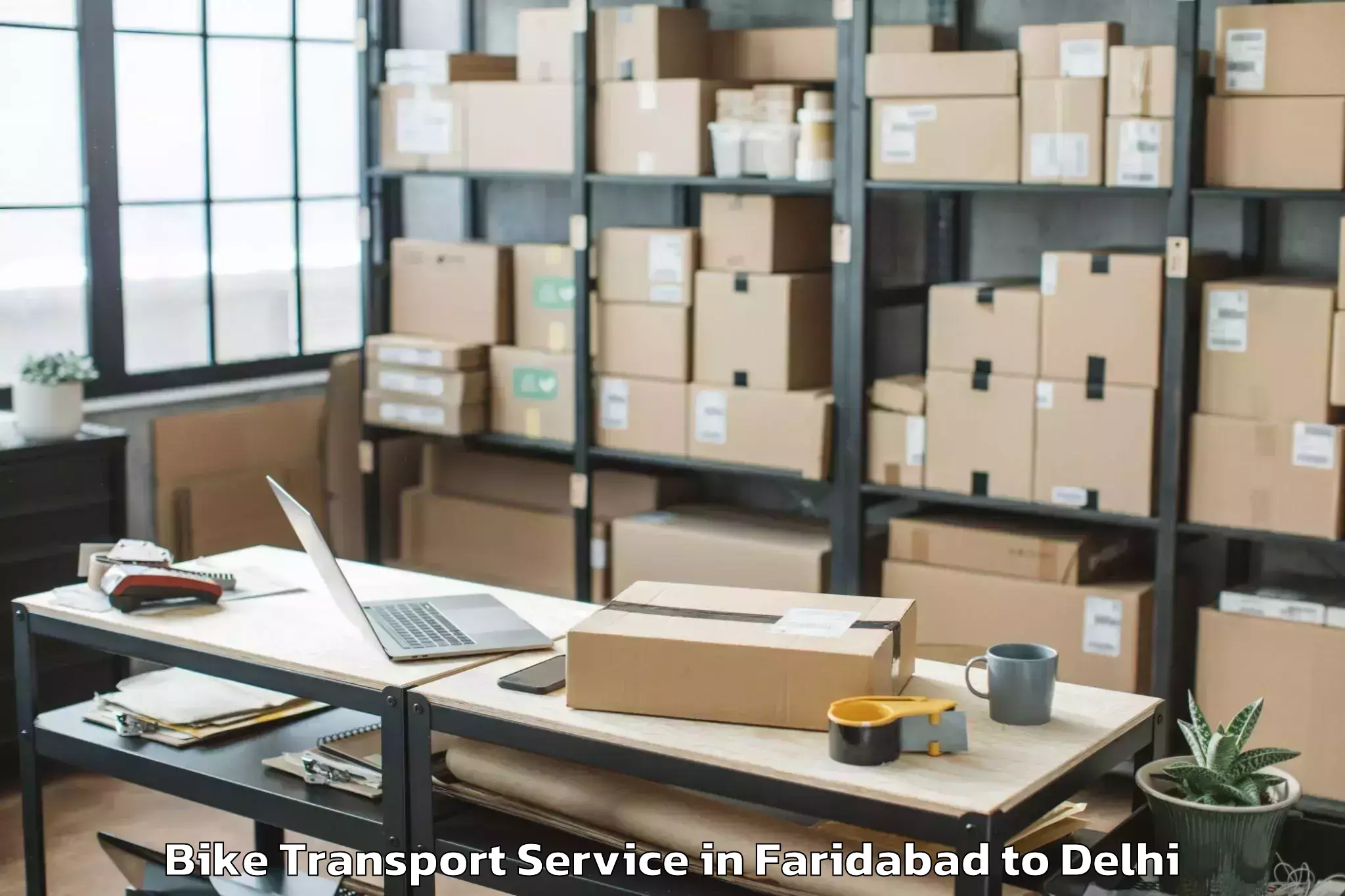 Book Faridabad to South Asian University New Del Bike Transport Online